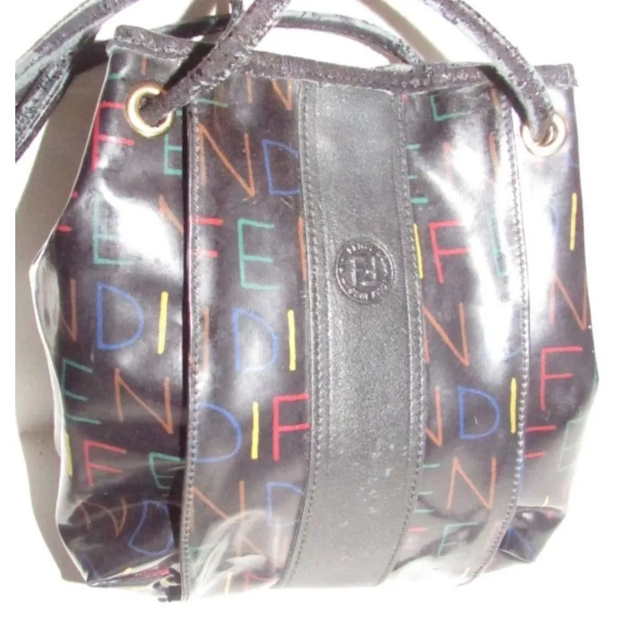 Fendi SAS multi-colored logo on black leather mini backpack/bucket